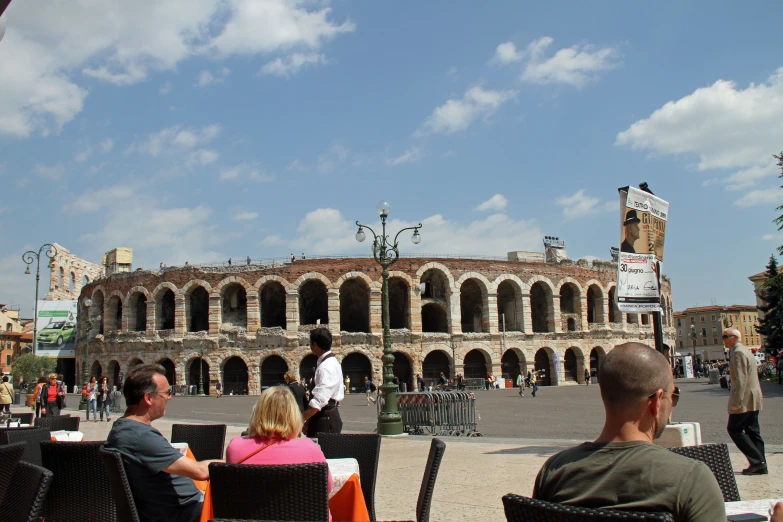 a building that looks like a theater for several people