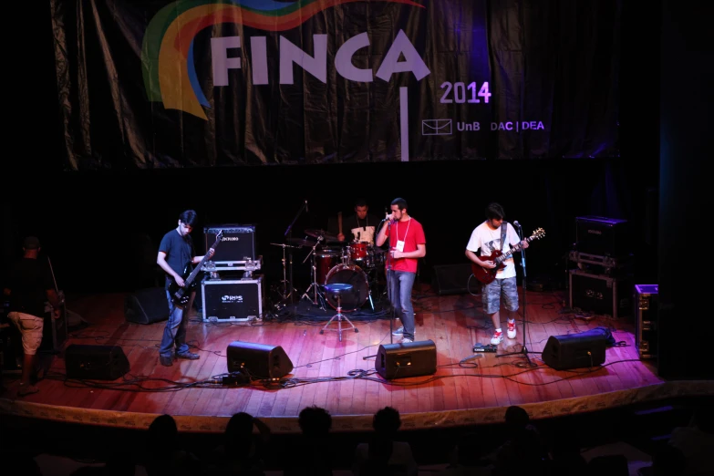 a band on a stage playing musical instruments