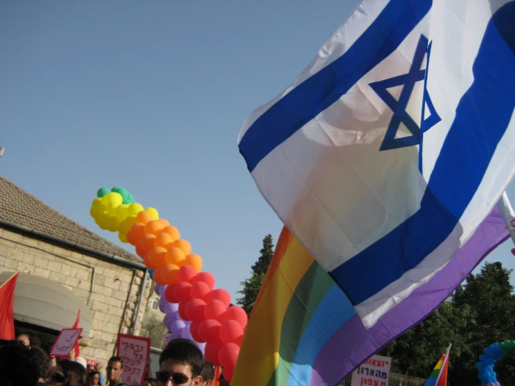 people march in to the street during a rally