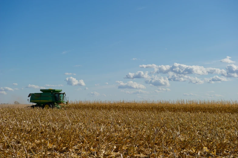 a tractor parked in the middle of a field