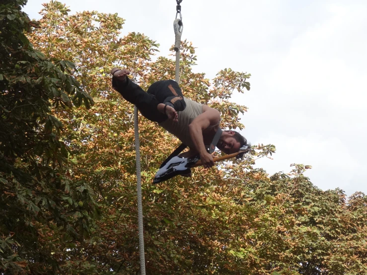 a man doing a trick on a skateboard