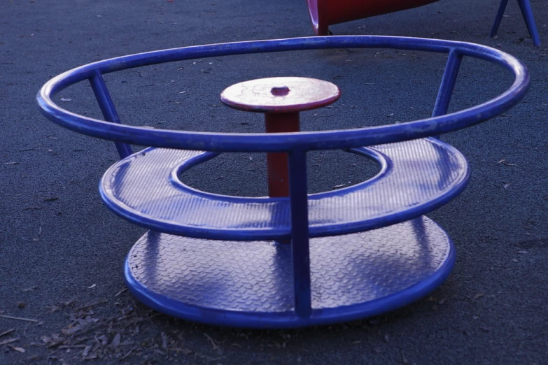 some very nice little playground items on a black carpet