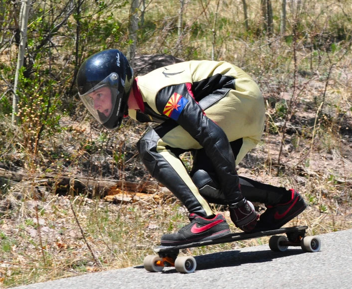 a person in a helmet is on a skateboard