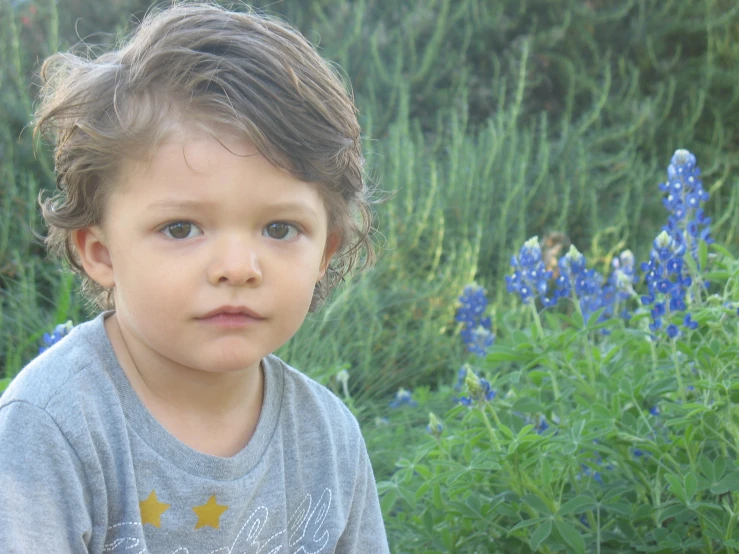 this young child has a frizzbee in his hand