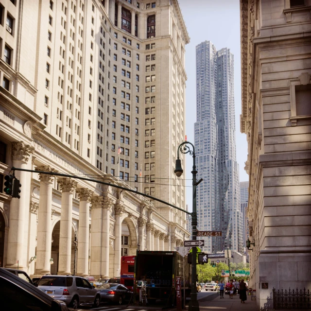 a busy city street lined with tall buildings