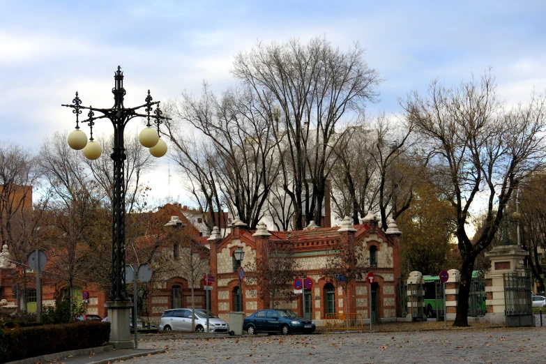 cars parked in front of a building that looks old