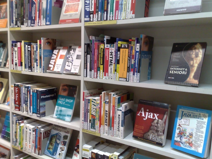 books on shelves filled with texts and pictures