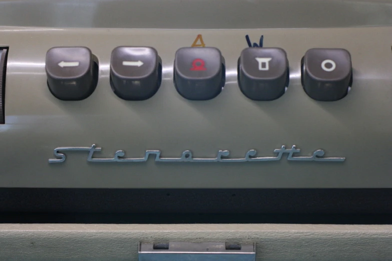 the keys are shown on the front of an old typewriter