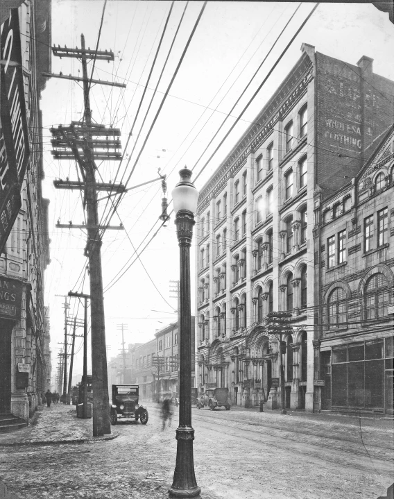 an old po of some buildings along the street