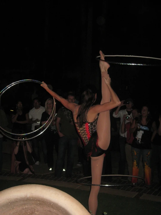 the young woman is engaged in a ring contest with other people