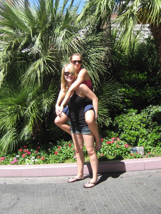 two women are posing for a po together