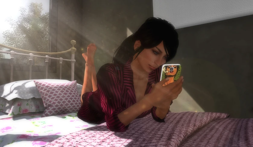 a lady in her bed looking at her phone