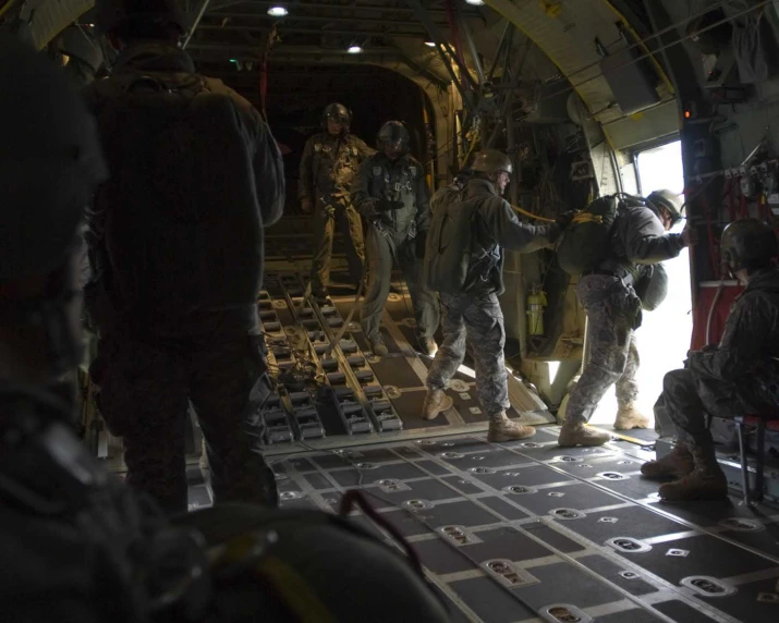 several men walking into an air force tunnel