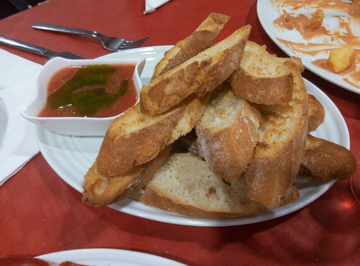 a plate topped with lots of french toast