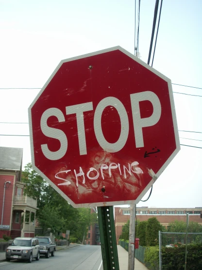 a stop sign with graffiti on the bottom of it