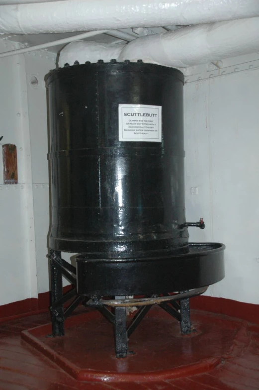 a very large drum sitting in the middle of a room