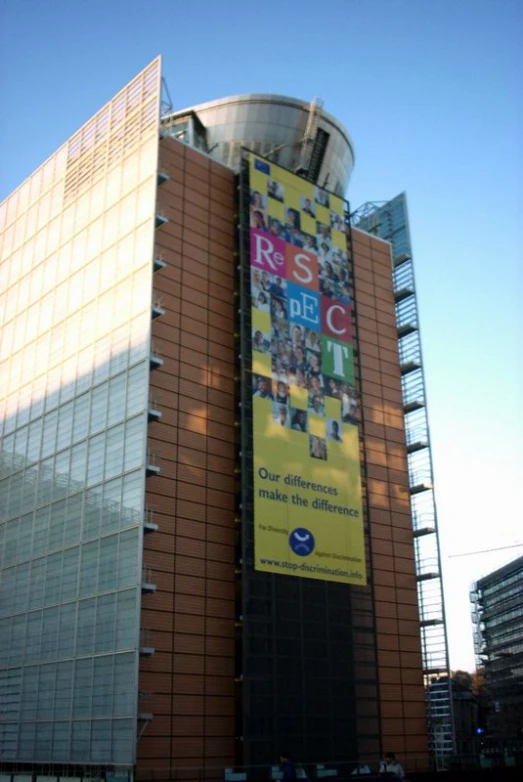 large building with advertits on the side of it