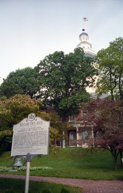 the state house in montgomery, mississippi with the dome of the old state house in the distance