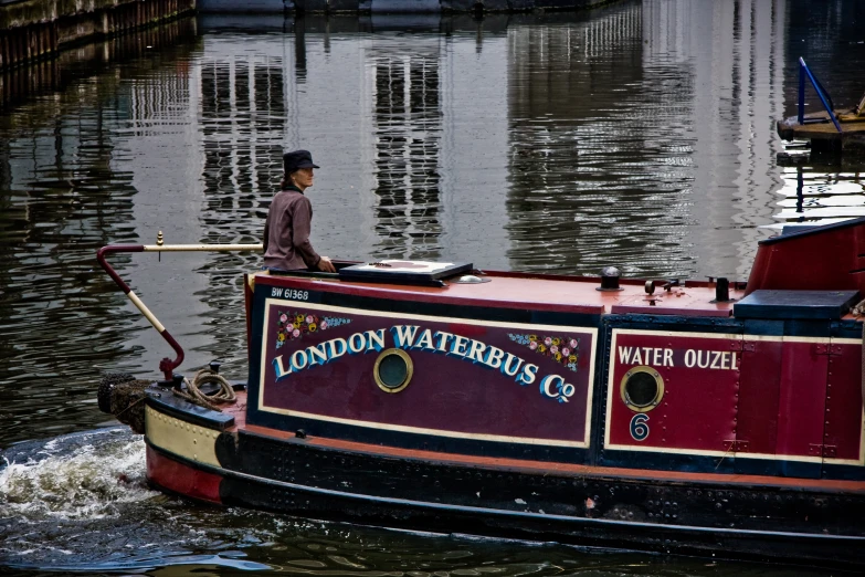 there is a man that is on top of the boat