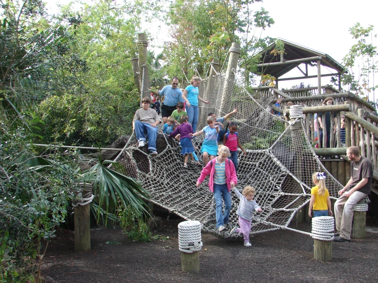 a group of people in a play area