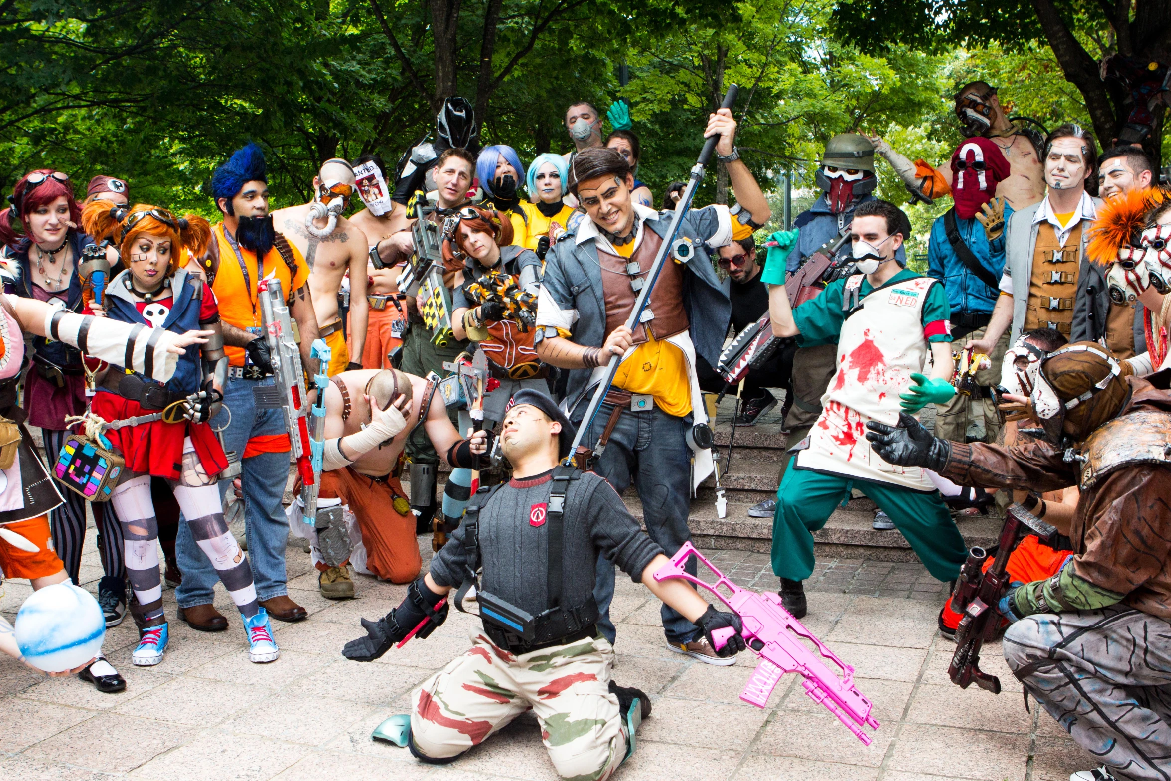 a group of people dressed up in costumes standing next to each other