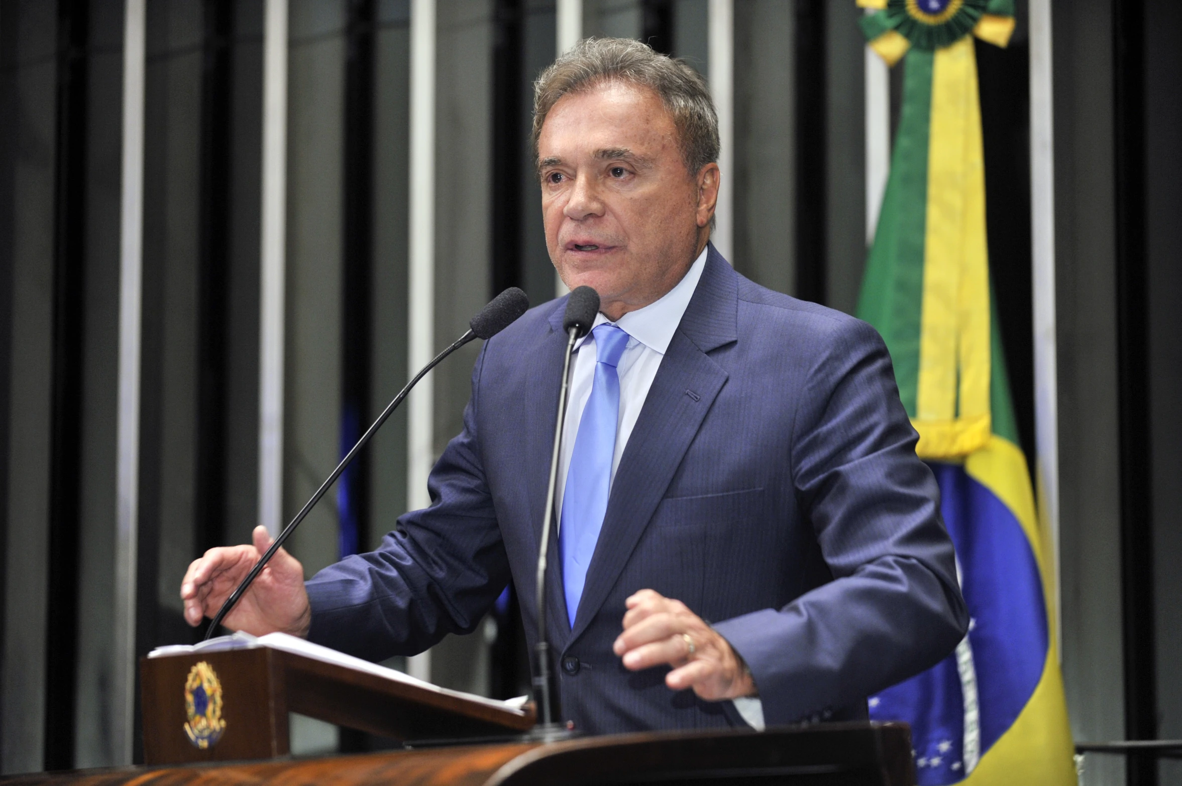 a man is giving a speech to a group