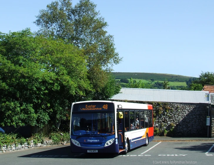 a public transit bus in the city parking lot