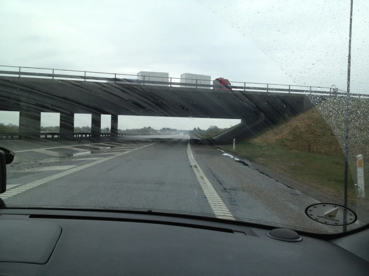 the windshield of a car shows the traffic