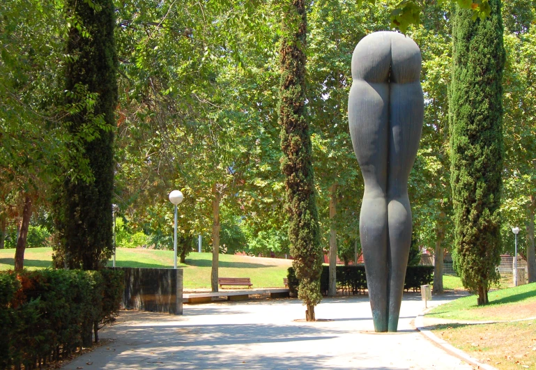 a big metal statue that is sitting in the middle of a street