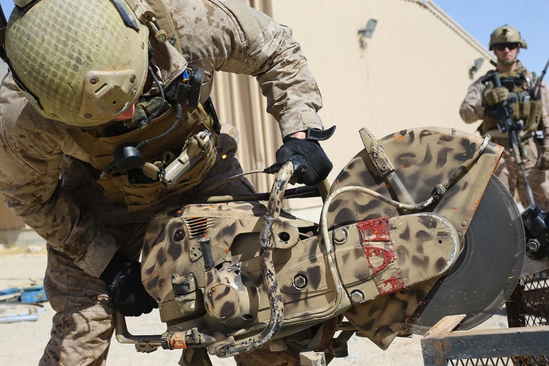 a soldier hing soing that is attached to the back of a motorcycle