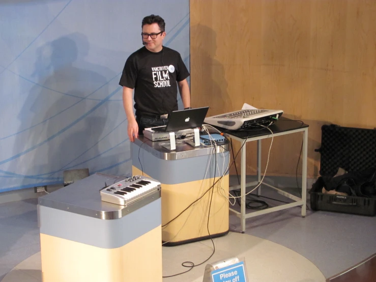 a man using a laptop on a table