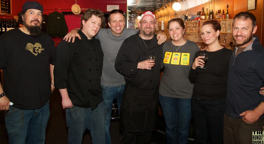 a group of people posing for a picture