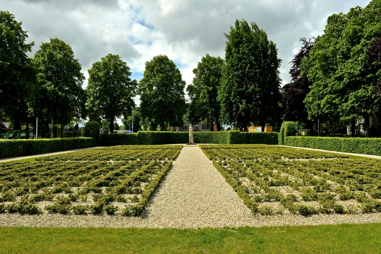 a large grass and stone maze in the middle of a field