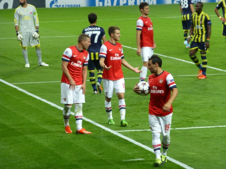 players shake hands during a soccer game