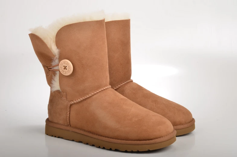 womens boots with on on top are on the white background