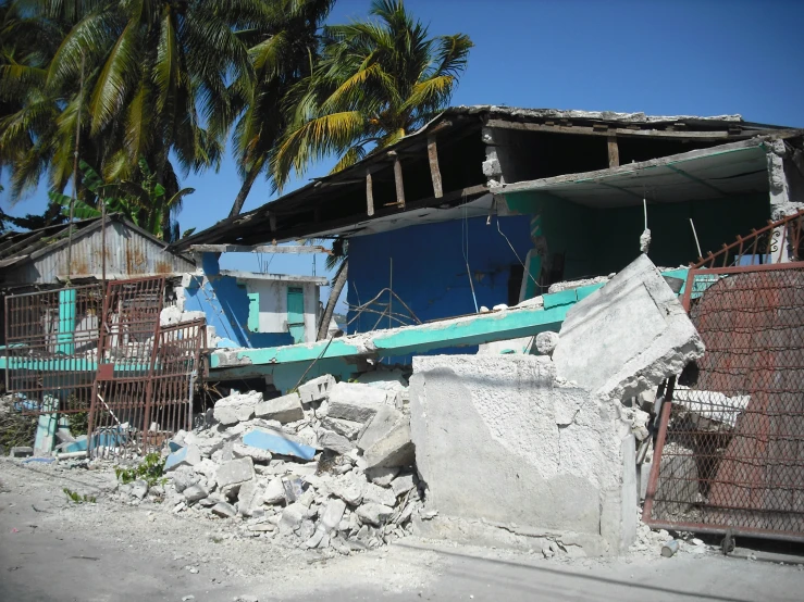 a number of buildings and fences near one another