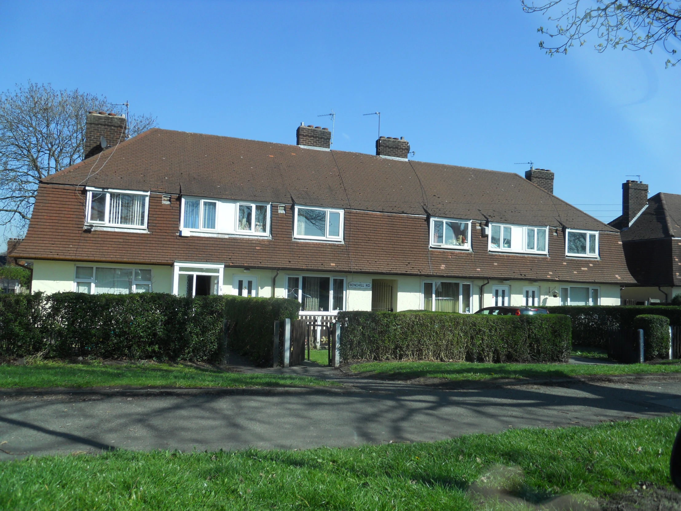 a house is shown in this residential area