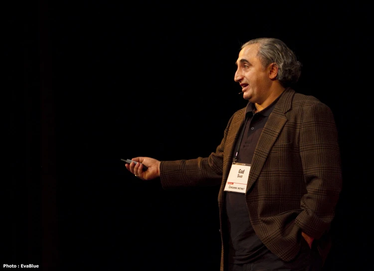 a man with a microphone speaking at an event