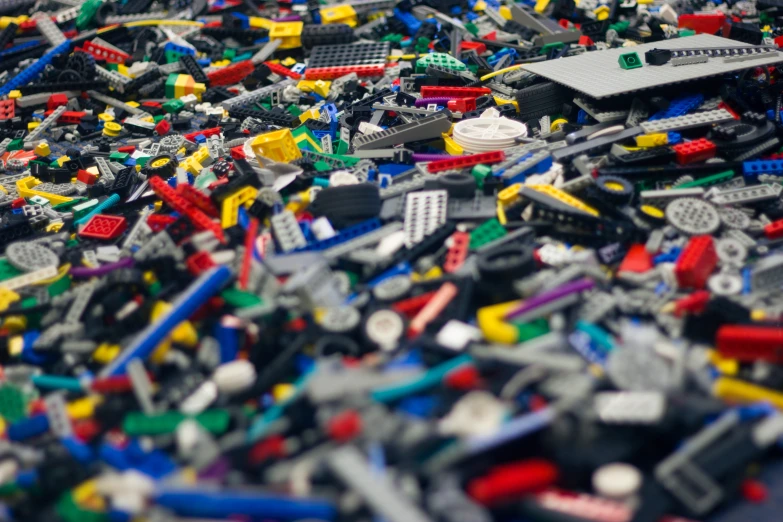 some toys and legos are lying in the process of being made