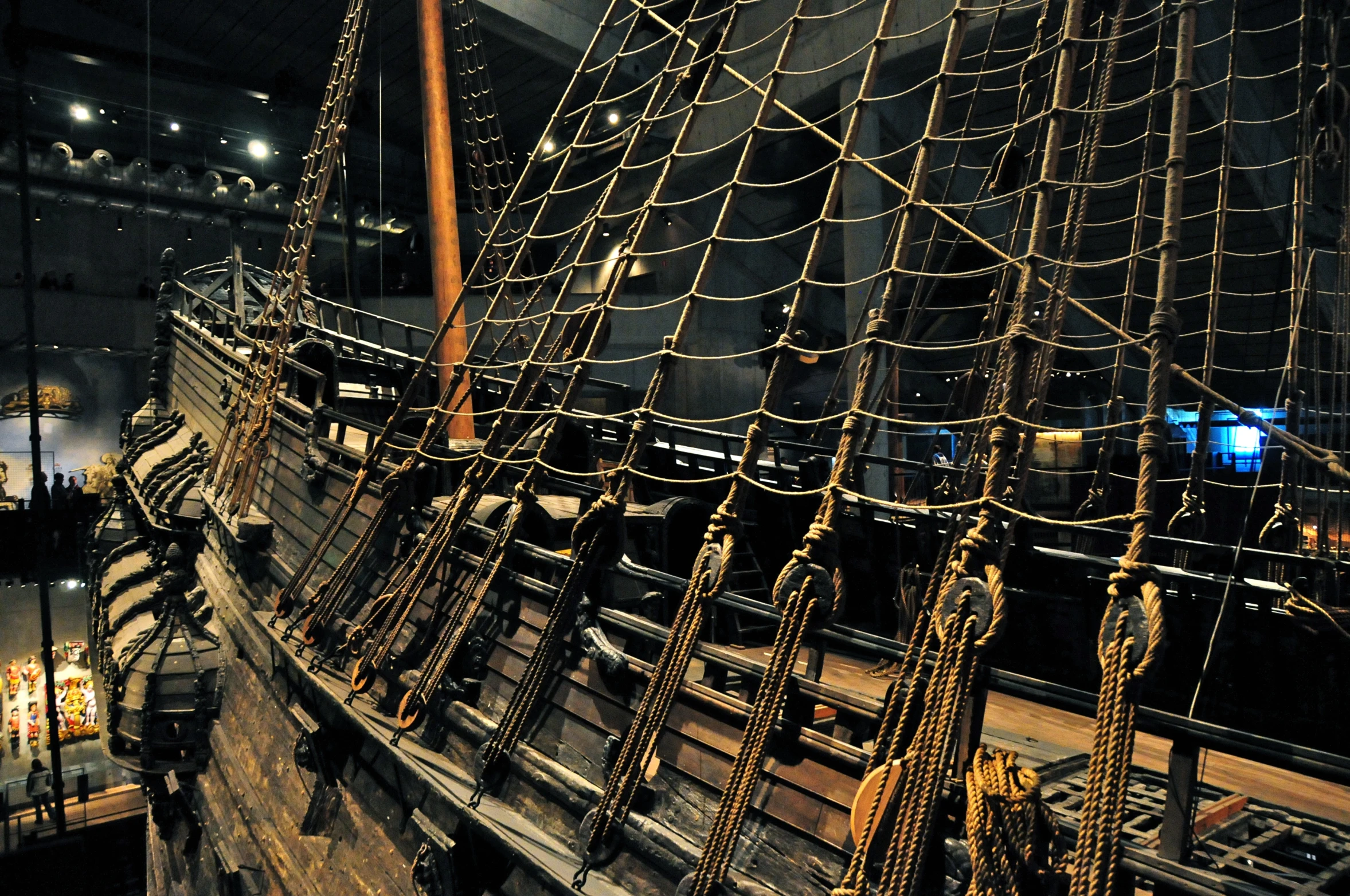 an old fashioned wooden sail boat at night