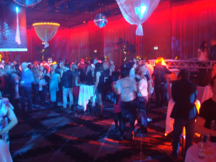 a party is set up with a group of people dancing