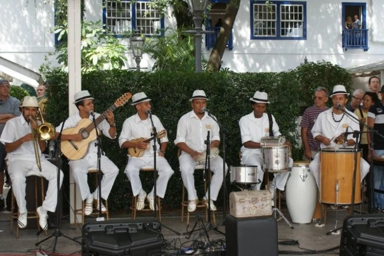 an image of band on stage playing music