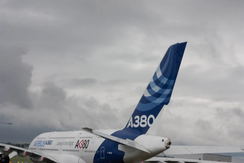 a large jetliner sitting on top of an airport tarmac