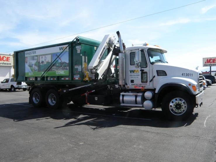 the large dump truck has been moved down the road