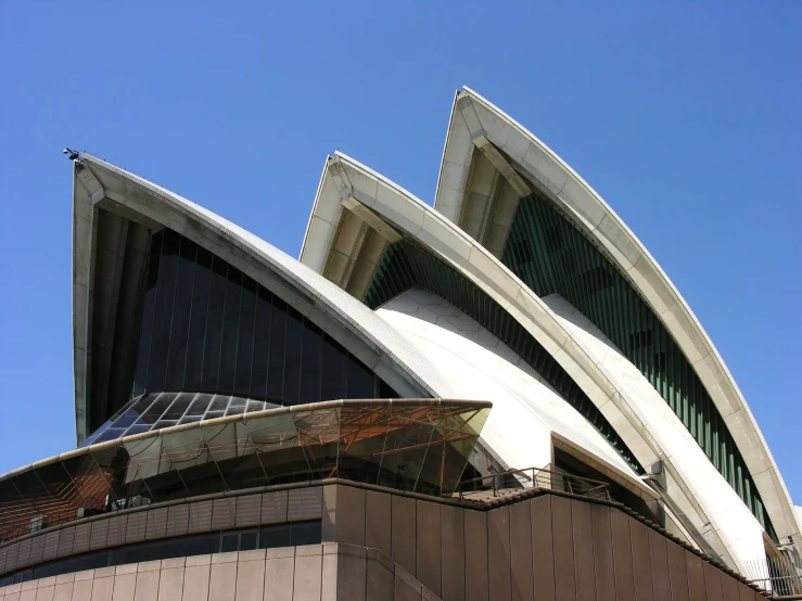 a very tall building with some big curves on it