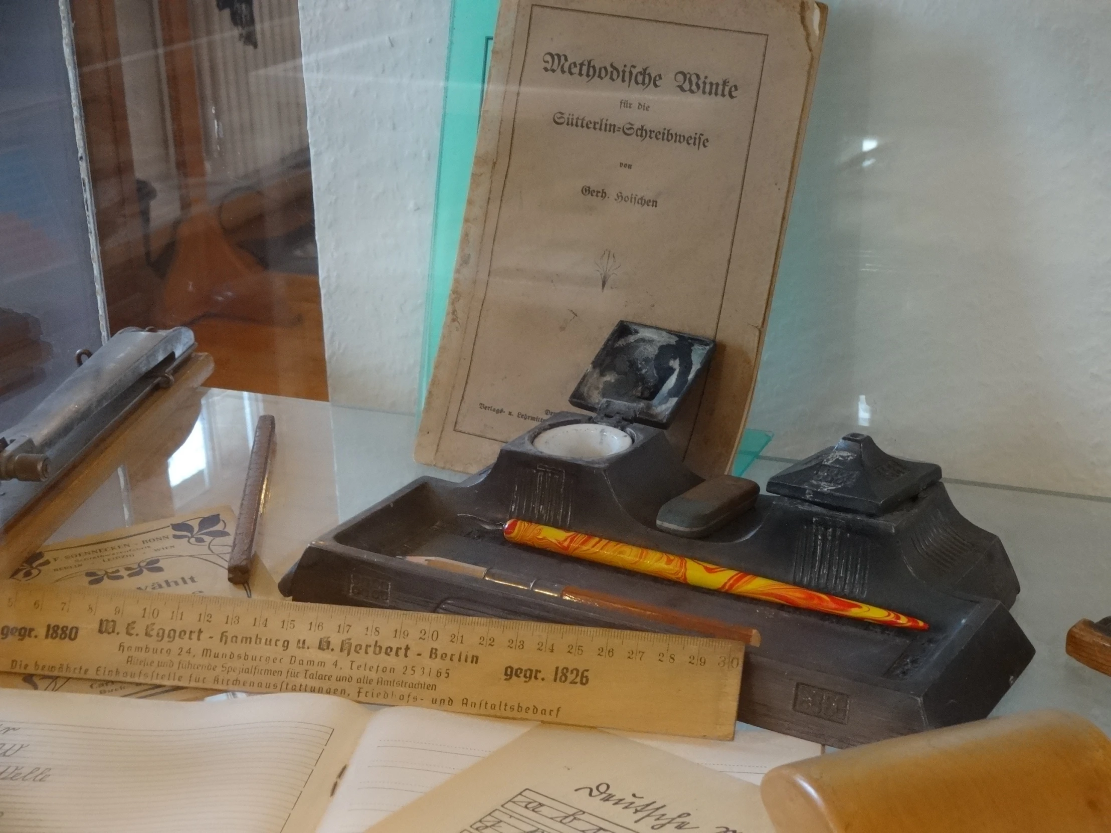 antique paper and inking supplies are on display