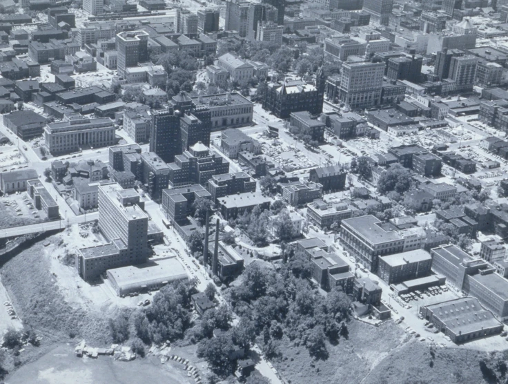 black and white pograph of a city with many buildings