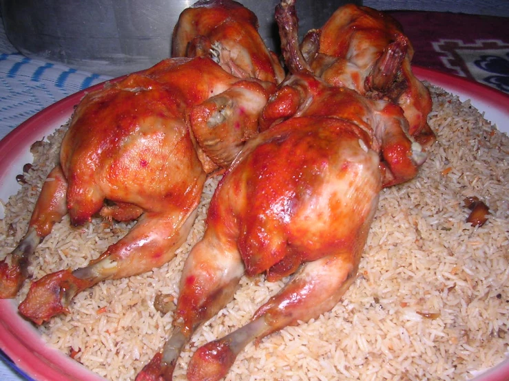 chicken and rice with a knife on a plate