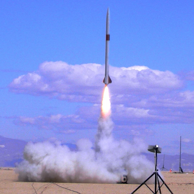 a rocket that is flying in the air