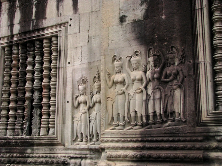 an intricately carved wall decoration in a temple